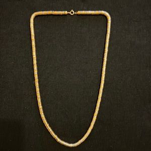 Vintage Saks Fifth Avenue gold and silver disc necklace
